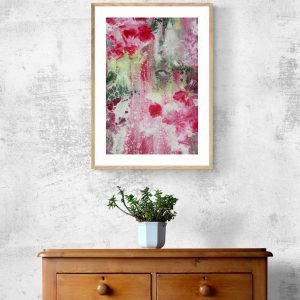 A framed example of red and pink flowers acrylic artwork availabe for download.